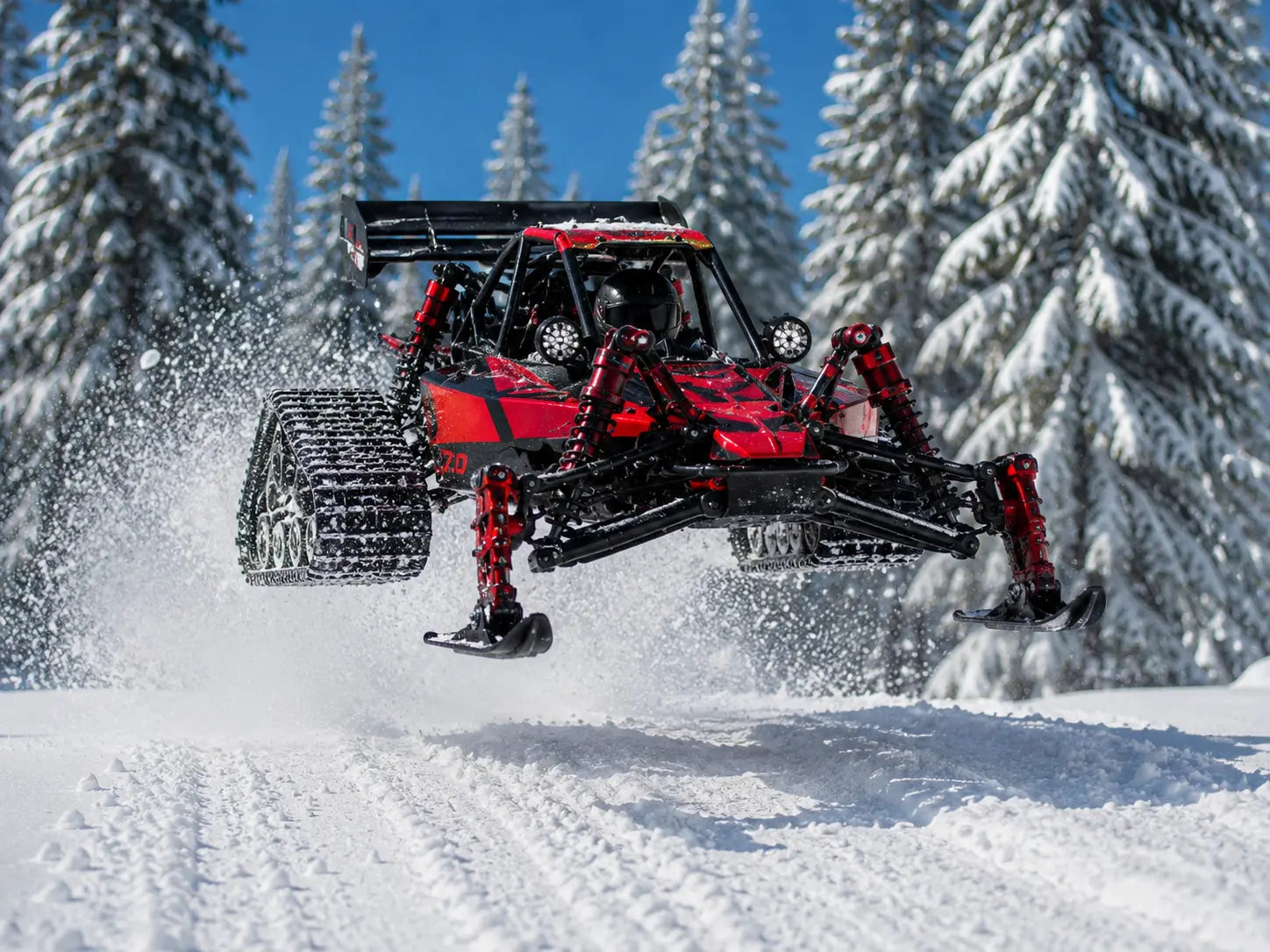 RC buggy Baja 1/5 jumping in snow.
